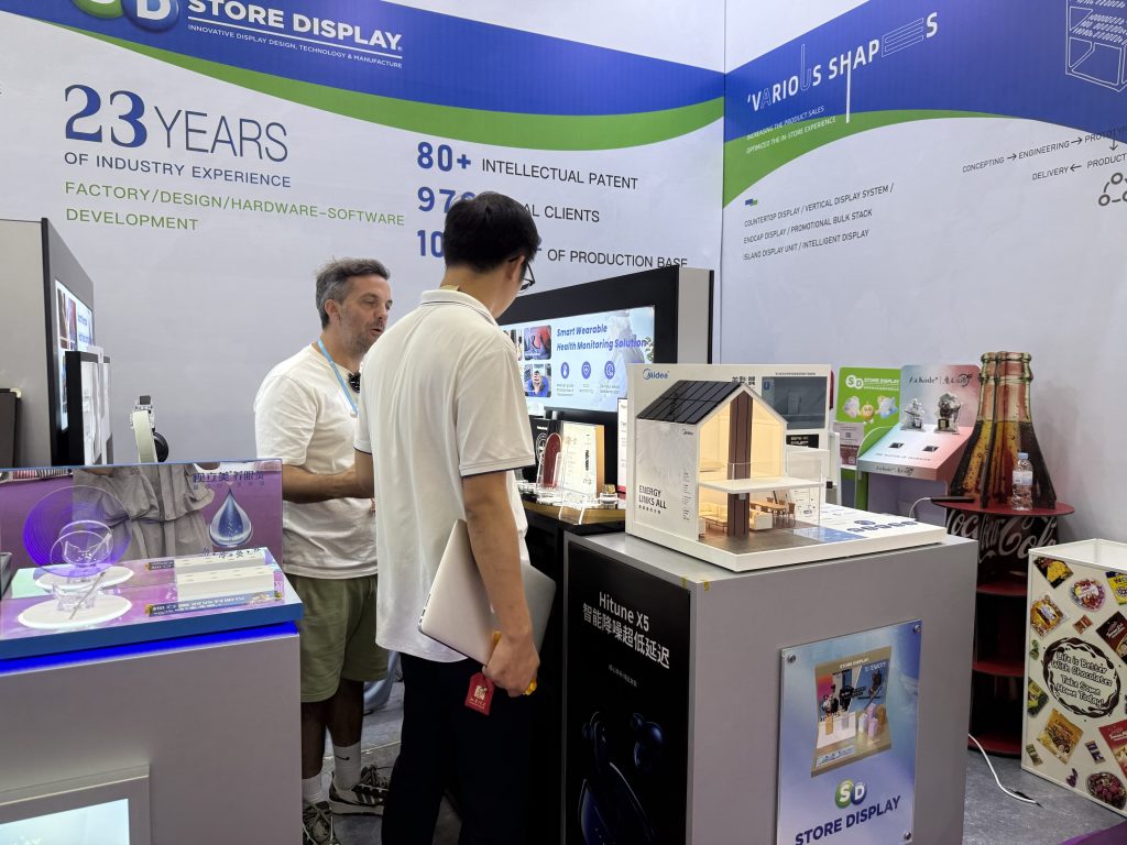 Store Display Group team engaging with global brand partners during the 137th Canton Fair exhibition.
