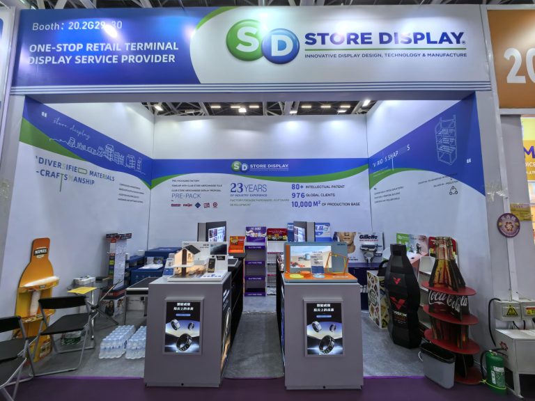 Store Display Group booth at the 137th Canton Fair featuring digital countertop displays for smart consumer goods.